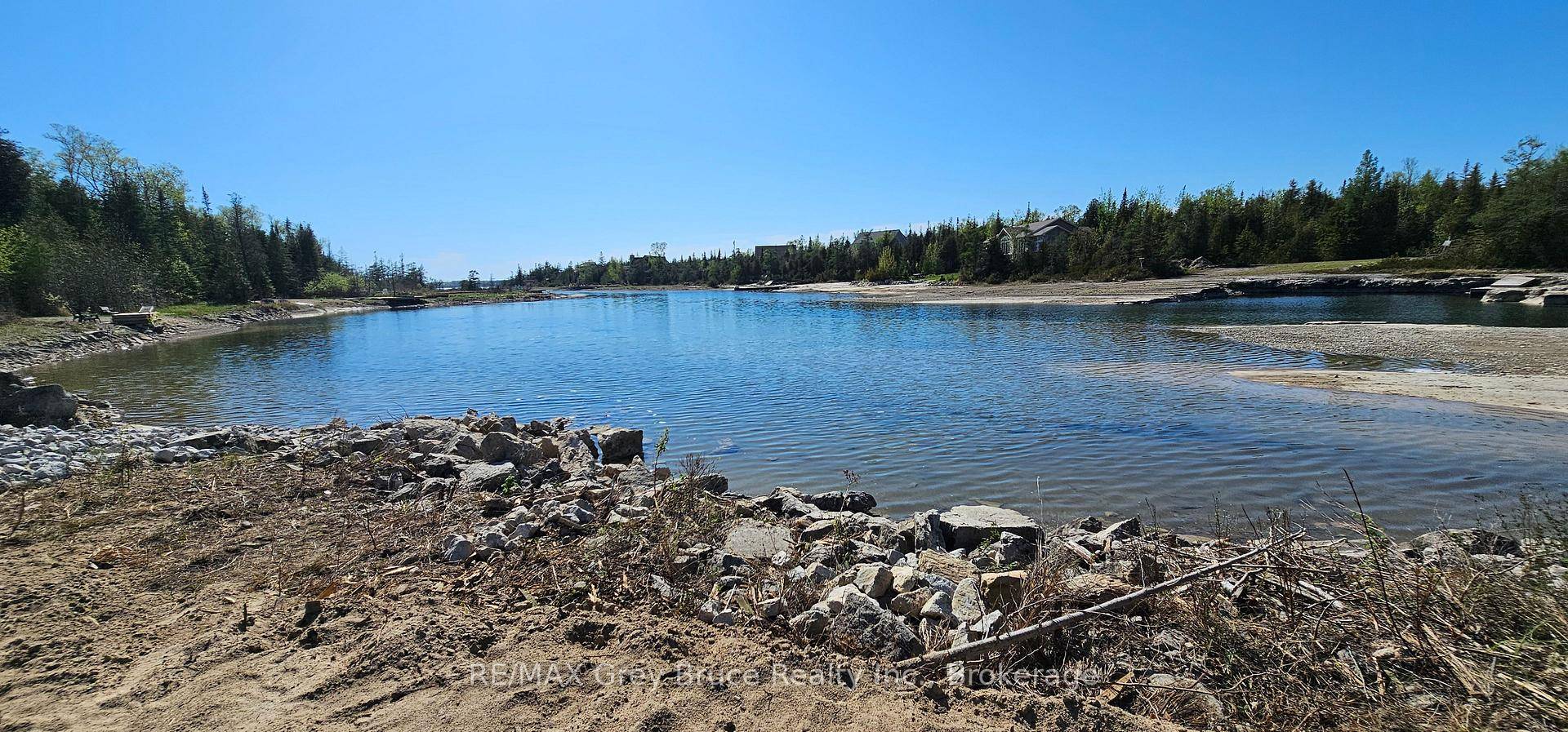 Here is an opportunity to own this vacant waterfront building lot located in an area of prestigious homes and cottages in Stokes Bay on Walter Charman Drive.