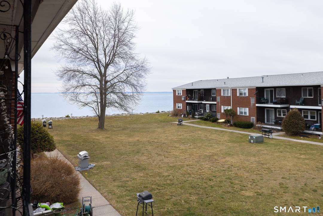 Is there a remodeled 2 bed condo at Walnut Beach with water views and private access ?