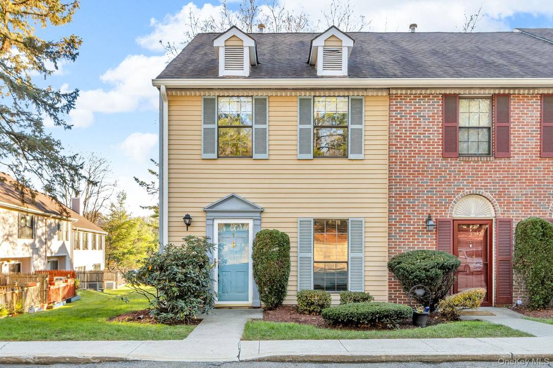 This charming townhouse is a corner unit, offering extra privacy and natural light.
