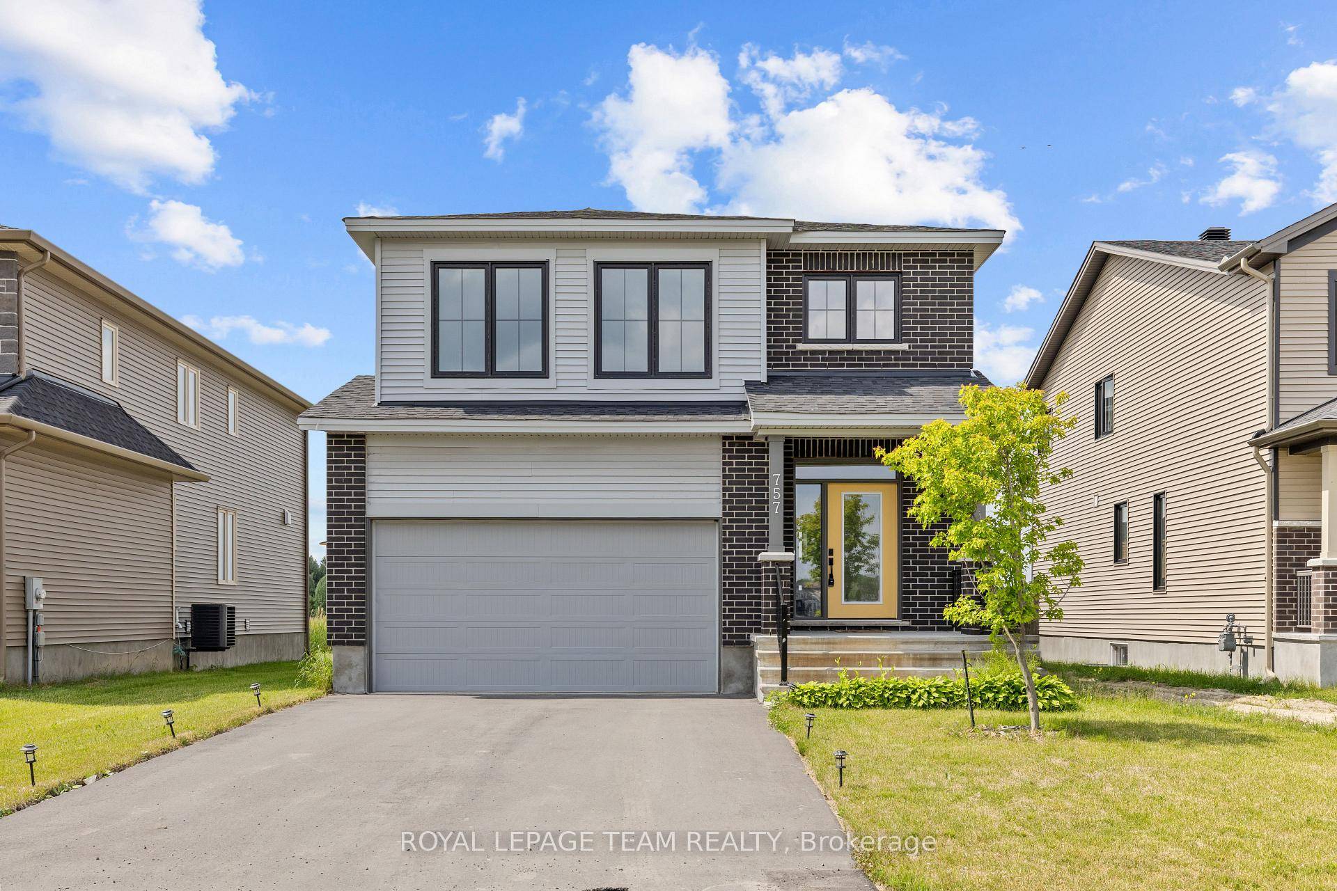757 Gamble Drive is a rare offering in Russellwhere modern architectural vision meets upscale living on an oversized 50x130 ft lot.