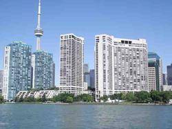 Welcome home to a magnificent 2 level, 1 Bed condo, boasting a panoramic, clear view of Lake Ontario from the living room.