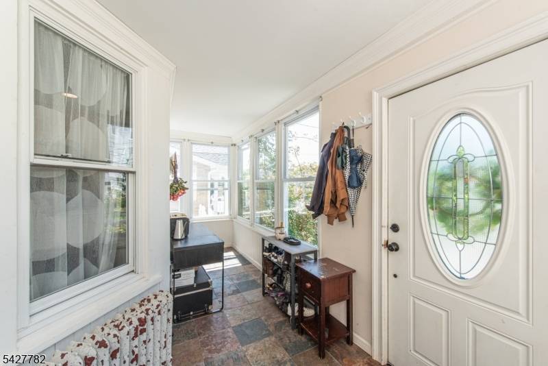 Charming 3 bedroom, 2. 5 bath Colonial featuring beautiful original woodwork and hardwood floors throughout the first floor.