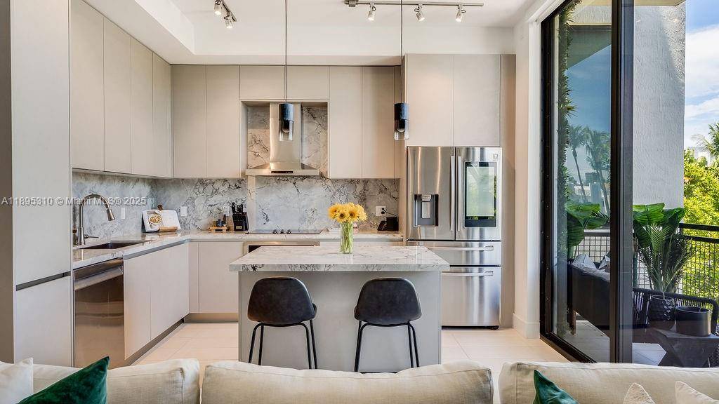 Experience South Beach sophistication in this spacious 1 Bed Den 2 Bath residence.