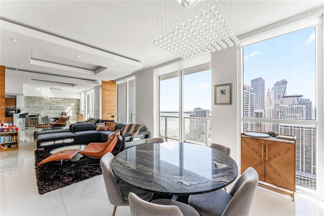 A rare, one of a kind residence featuring unique, custom finishes originally designed as the developer s showcase unit.