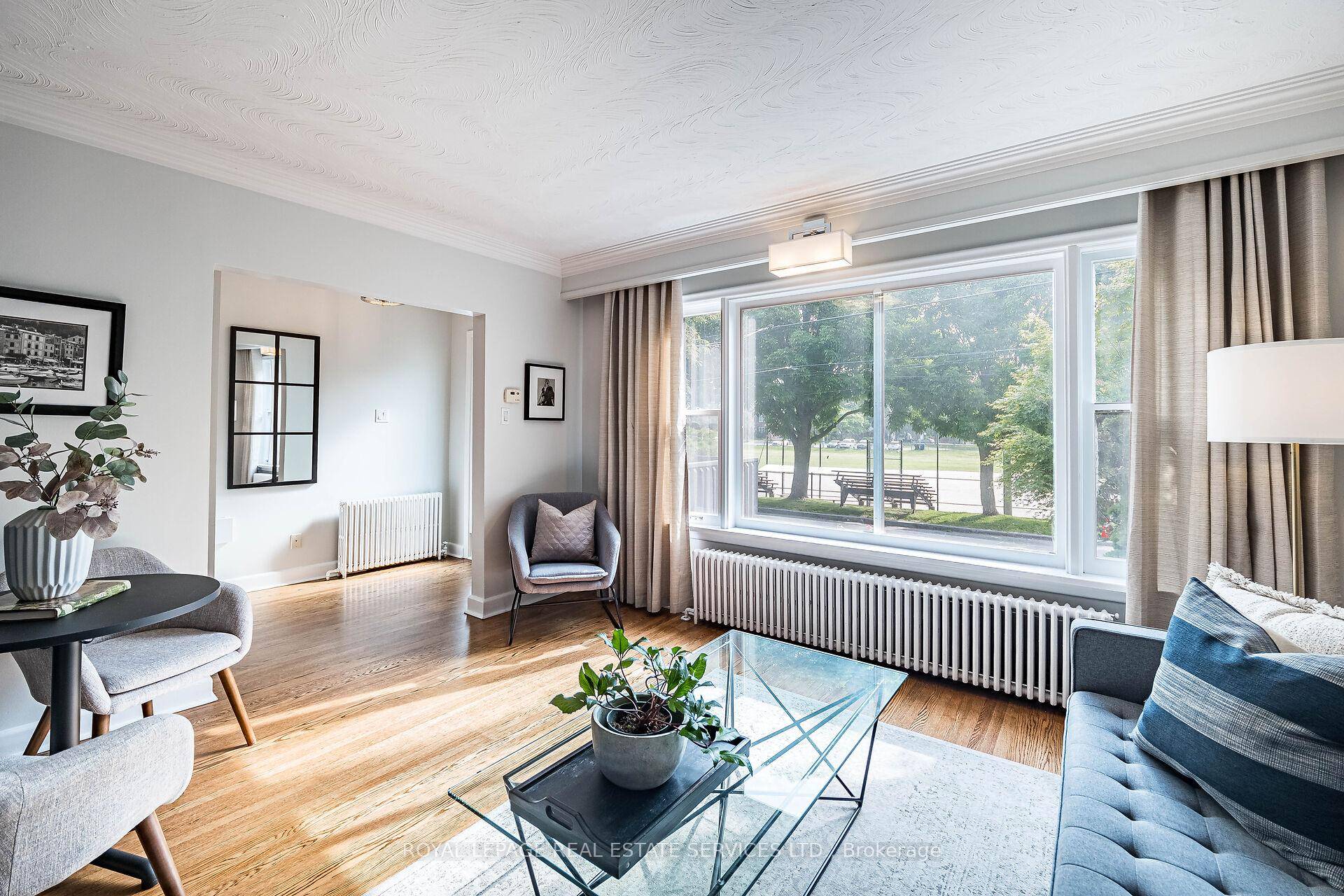 A simply delightful family home with an unbeatable lakeside location and private drive !