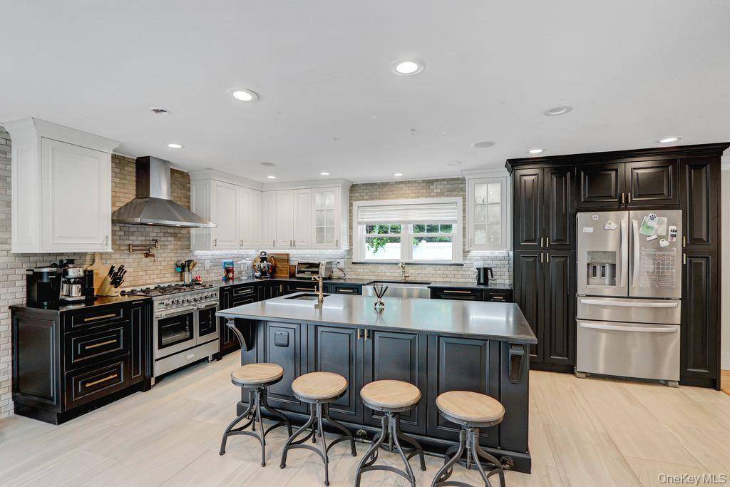 Pristine, Fully Renovated Farm Ranch featuring 3 spacious bedrooms and 3 luxurious full baths.