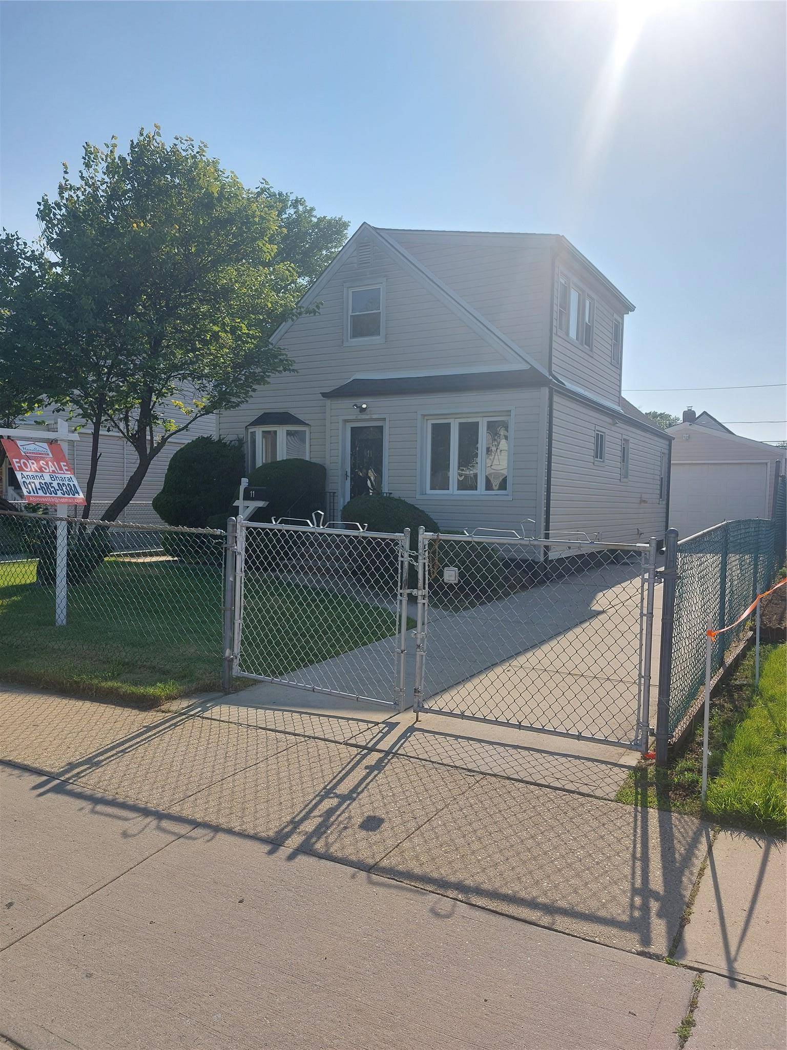 Charming And Renovated Dormer Cape in Town Of Elmont with the Possibility of Mother Daughter with Proper Permits, East of Hempstead Turnpike.
