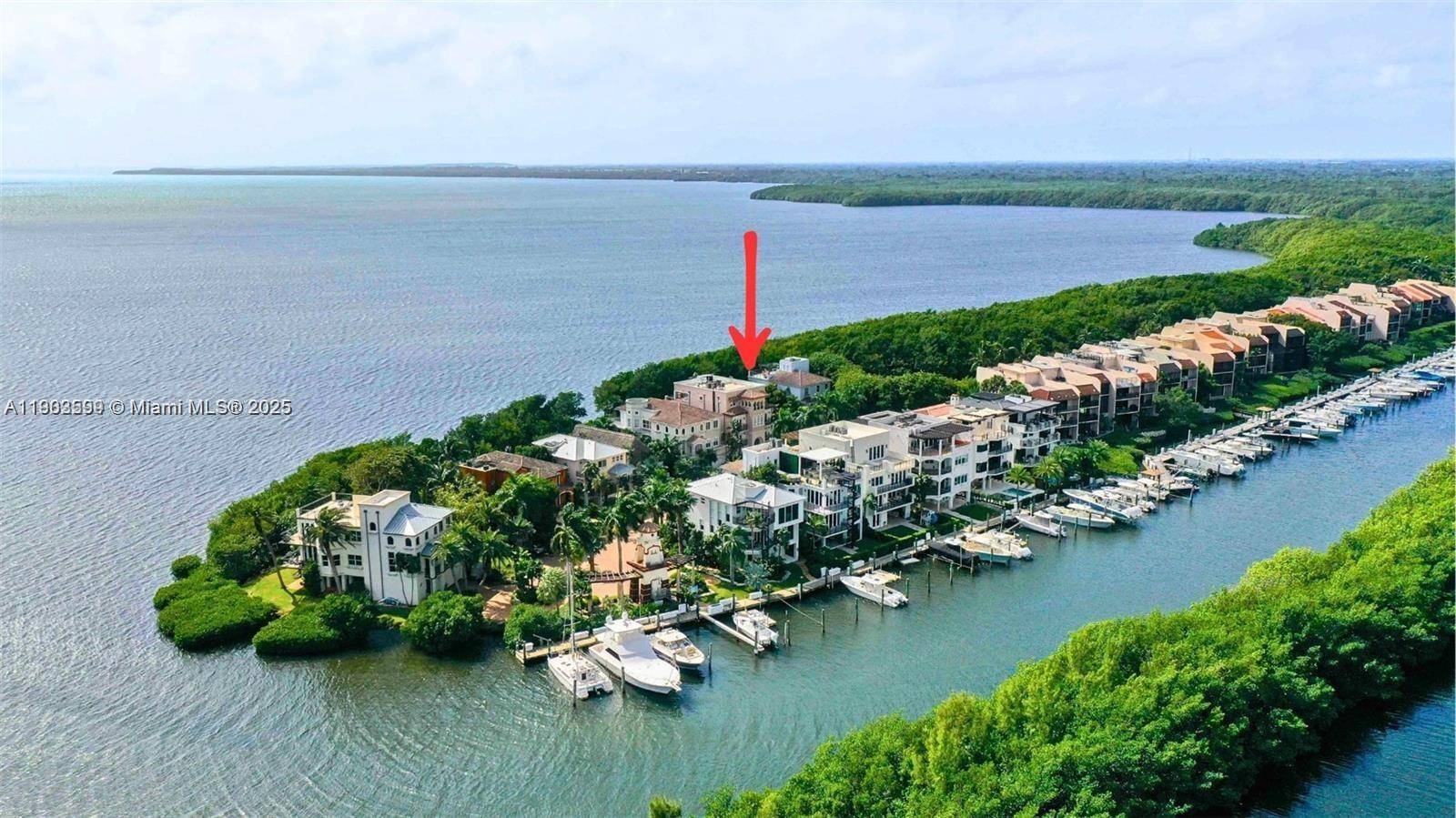 Discover the final bayfront vacant lot in exclusive Paradise Point, where every day feels like a resort getaway.