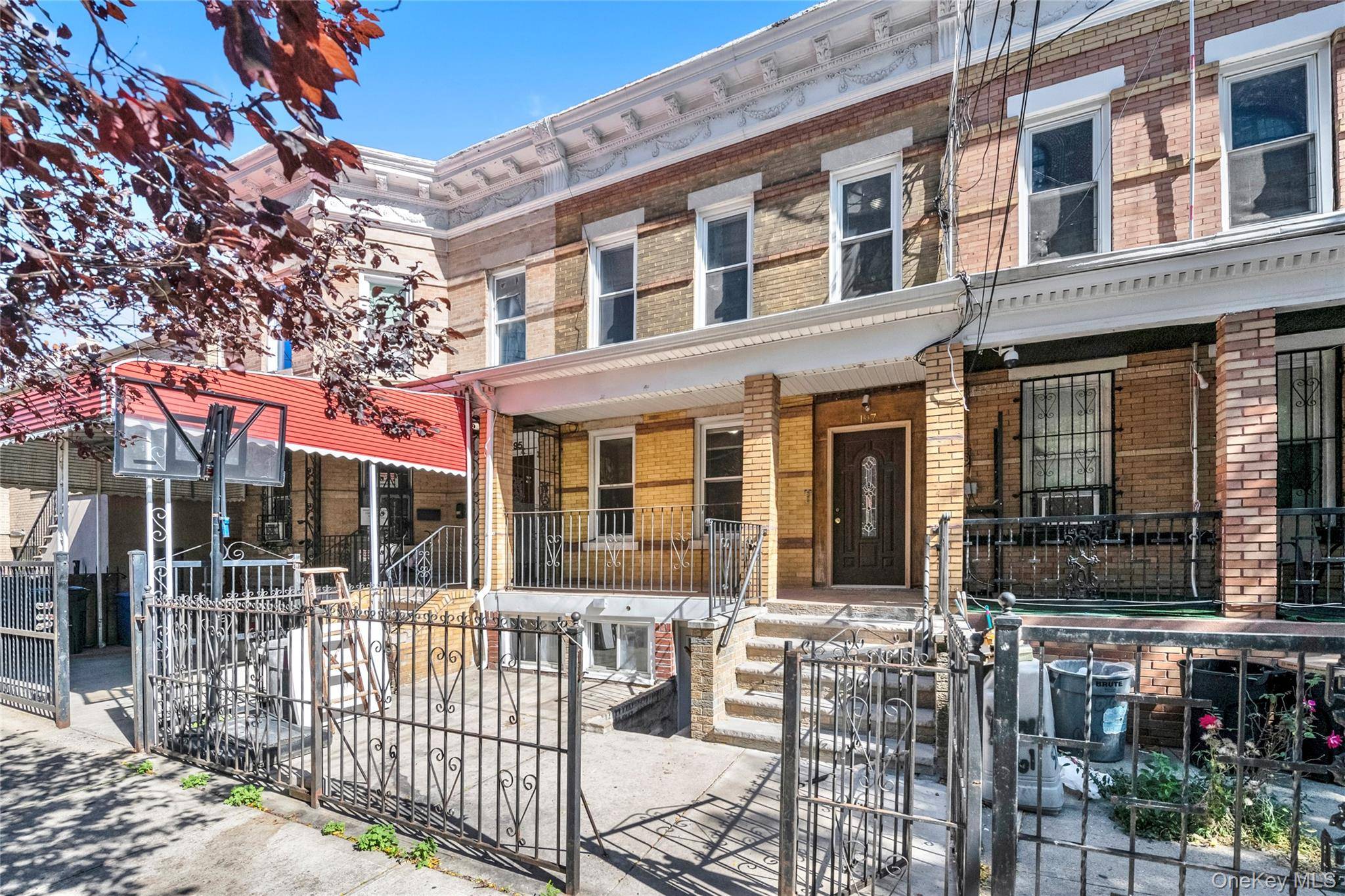 Discover a distinguished investment opportunity in this meticulously curated three family brick townhouse, a property that masterfully blends sophisticated urban living with exceptional financial performance.