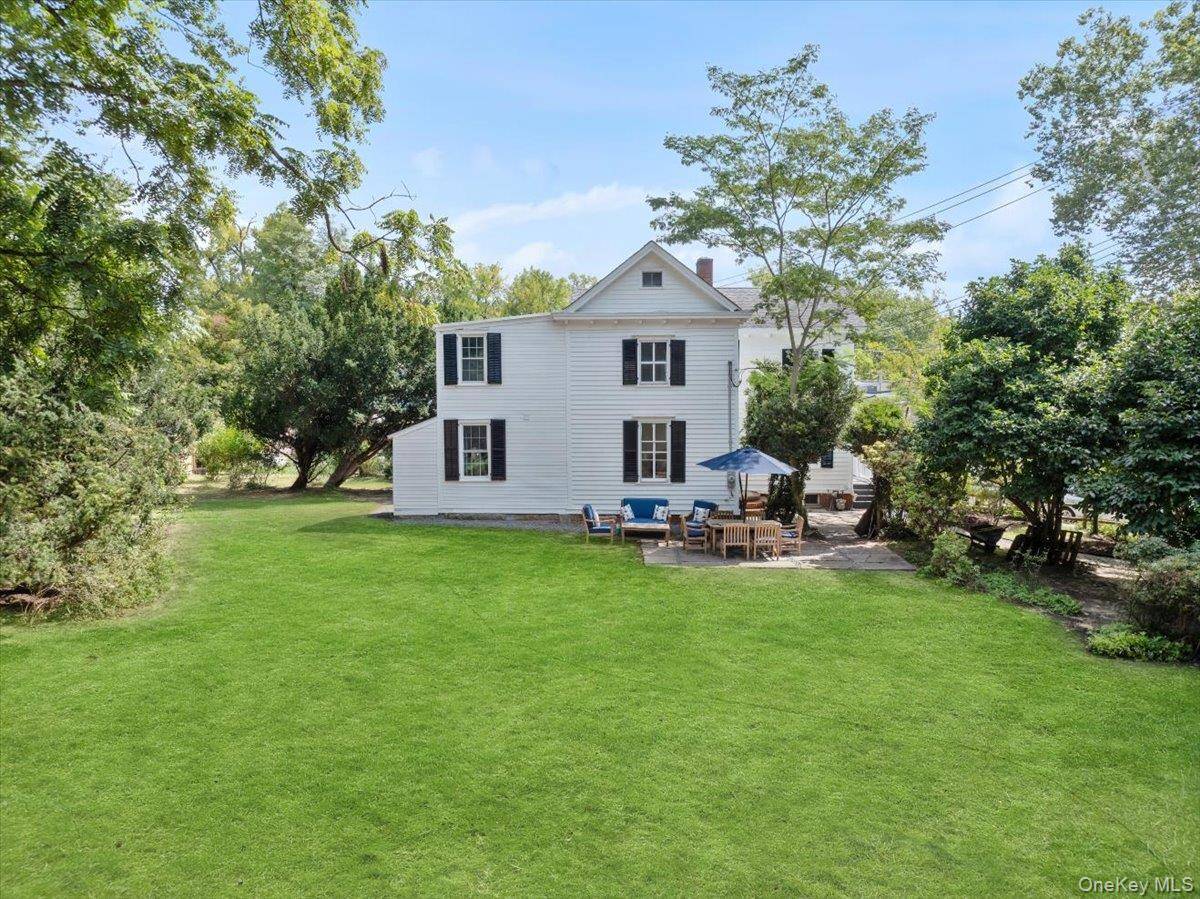 Don't be fooled by the Main Street address this property is privately situated on a corner lot, accessible from both streets.