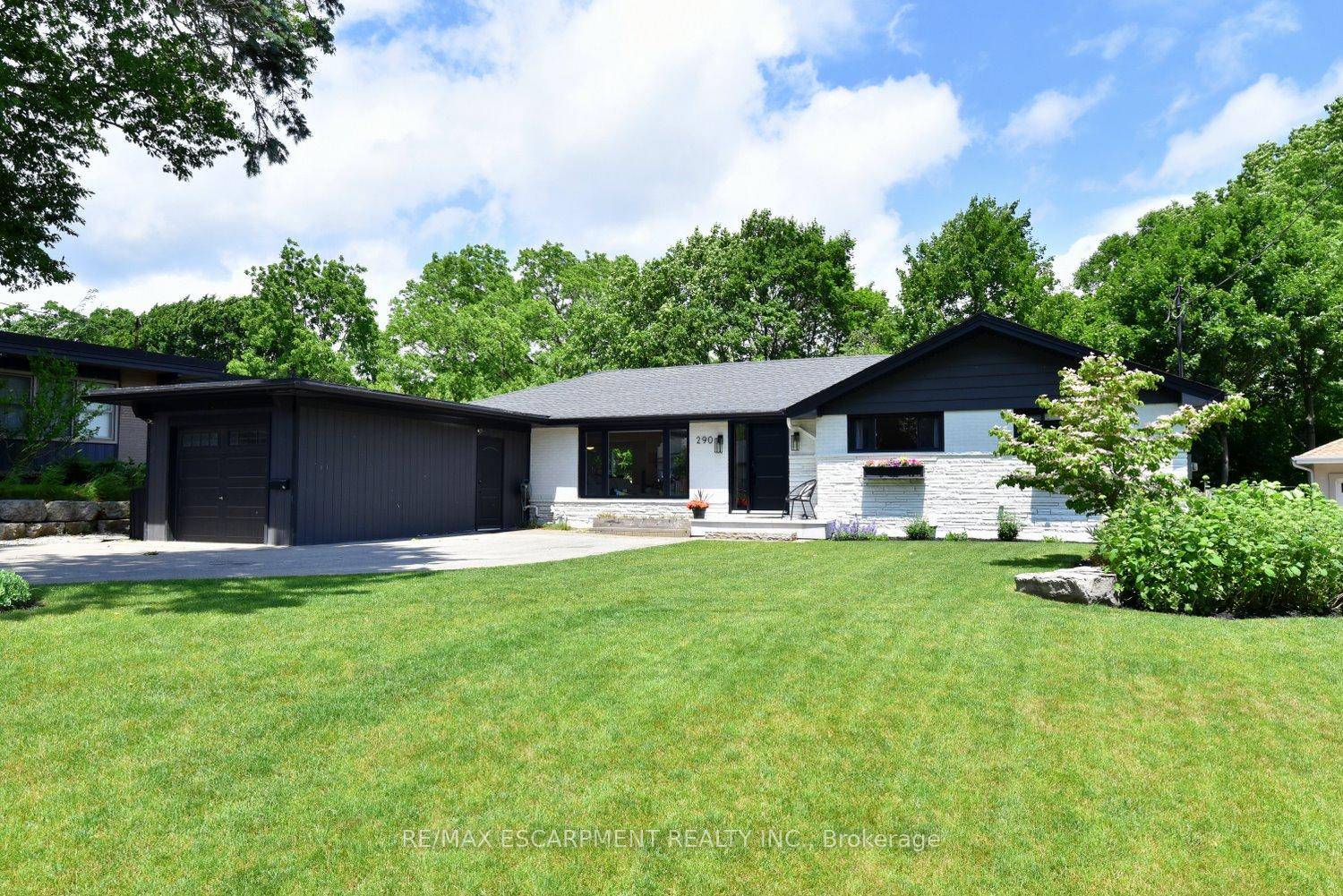 Tucked away on a quiet street and overlooking Grindstone Creek, this stunning, fully updated home offers the perfect blend of modern design and natural serenity.