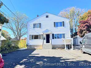 Attention Investors ! Great opportunity to own this beautiful 4 family home in the Cove area within walking distance to Cove Island beach and park.