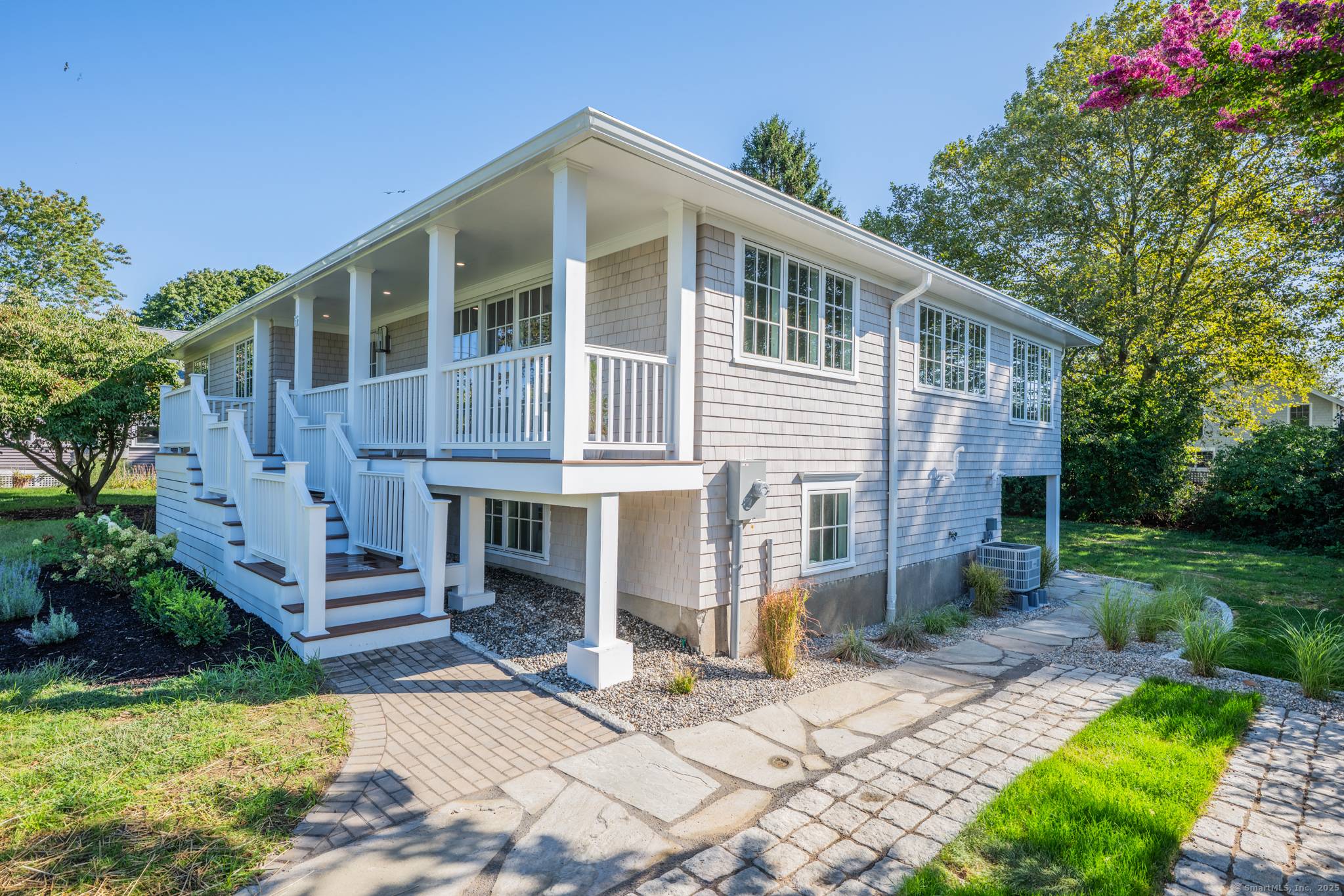 COME SEE THIS ONE OF KIND FULLY RENOVATED MADISON HOME WITH PRIVATE BEACH RIGHTS !