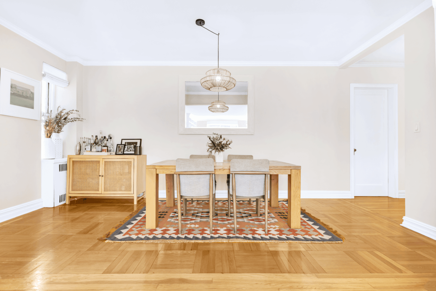 EXQUISITE ART DECO THREE BEDROOM Renovated six room home nestled in a picturesque brick and terracotta building on a serene, tree lined street in the heart of Carnegie Hill.