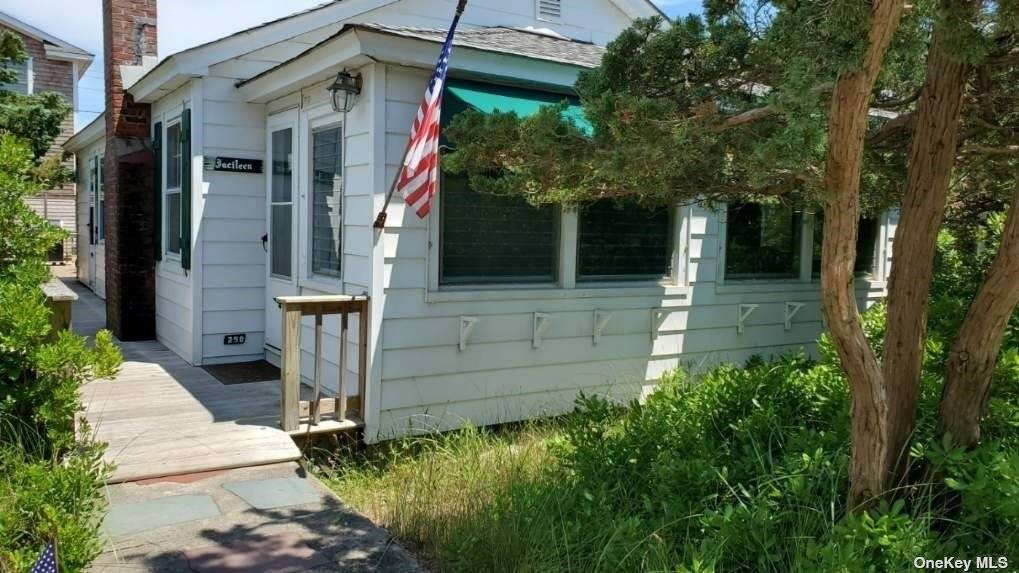 CLASSIC Old Fire Island Cottage w 4 bedrooms, 2 baths, screened in porch.