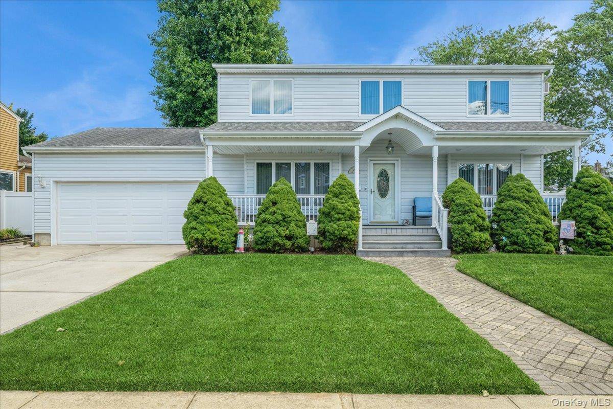 Beautifully Maintained 4 Bedroom Colonial Step into this inviting colonial home featuring a charming front porch and a welcoming entry foyer with a coat closet.