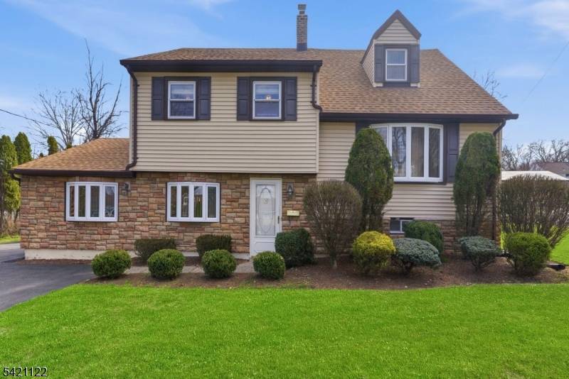 Beautifully maintained expanded split level home offering 3 spacious bedrooms and 2 full bathrooms, proudly owned and meticulously cared for by the same family for over 60 years.