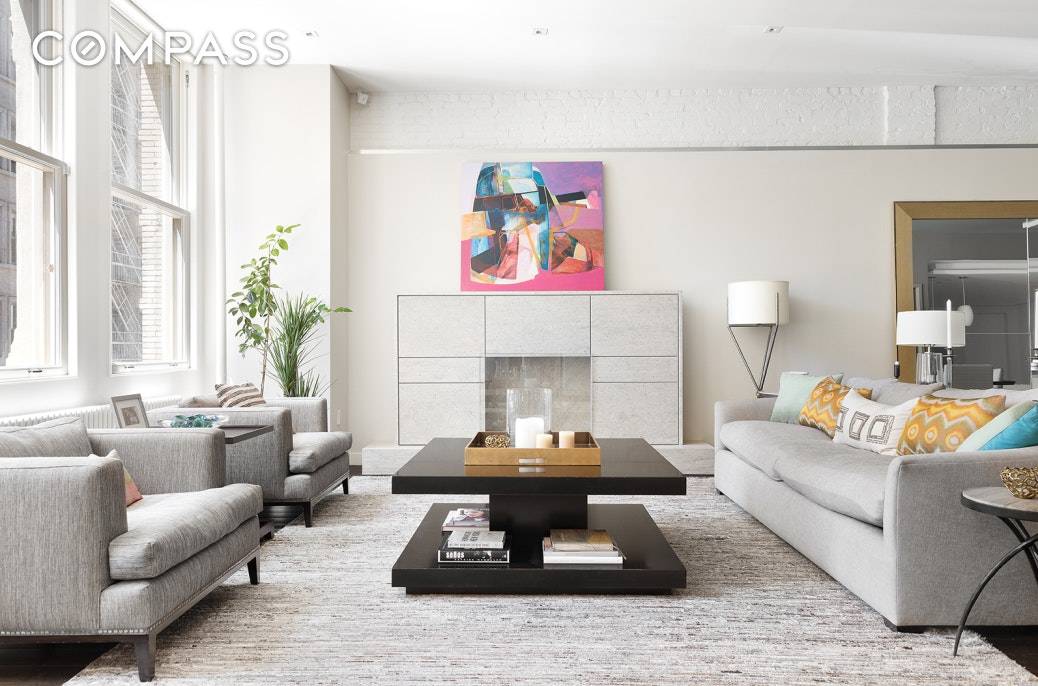 Virtual Matterport Tour Available This magnificent full floor Flatiron turn key condominium loft offers four bedrooms, three and a half baths, and soaring 11' ceilings and original columns.