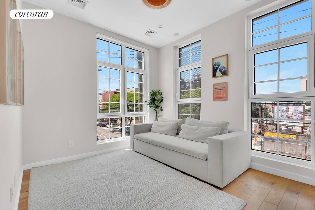 Sun Drenched Corner Triplex with Manhattan ViewsThis townhouse inspired upper triplex offers the expansive scale and privacy of a private home within an intimate boutique condominium.