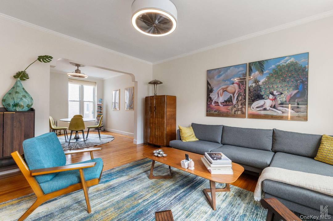 Bathed in eastern, western, and southern light, this top floor apartment in The Colonials offers the perfect blend of prewar charm and modern renovation.