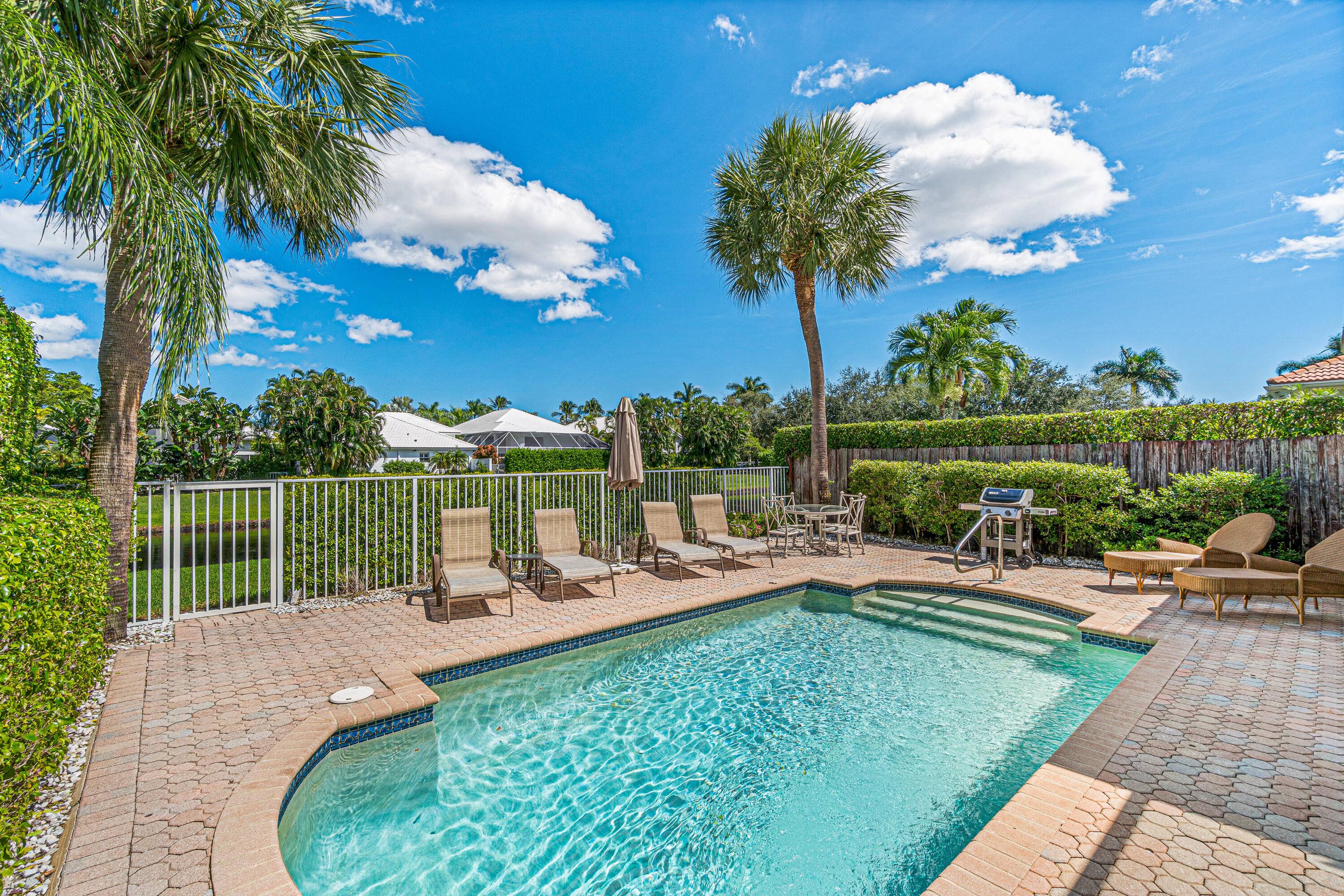 Welcome to this charming single story townhome, where modern sophistication meets peaceful living.