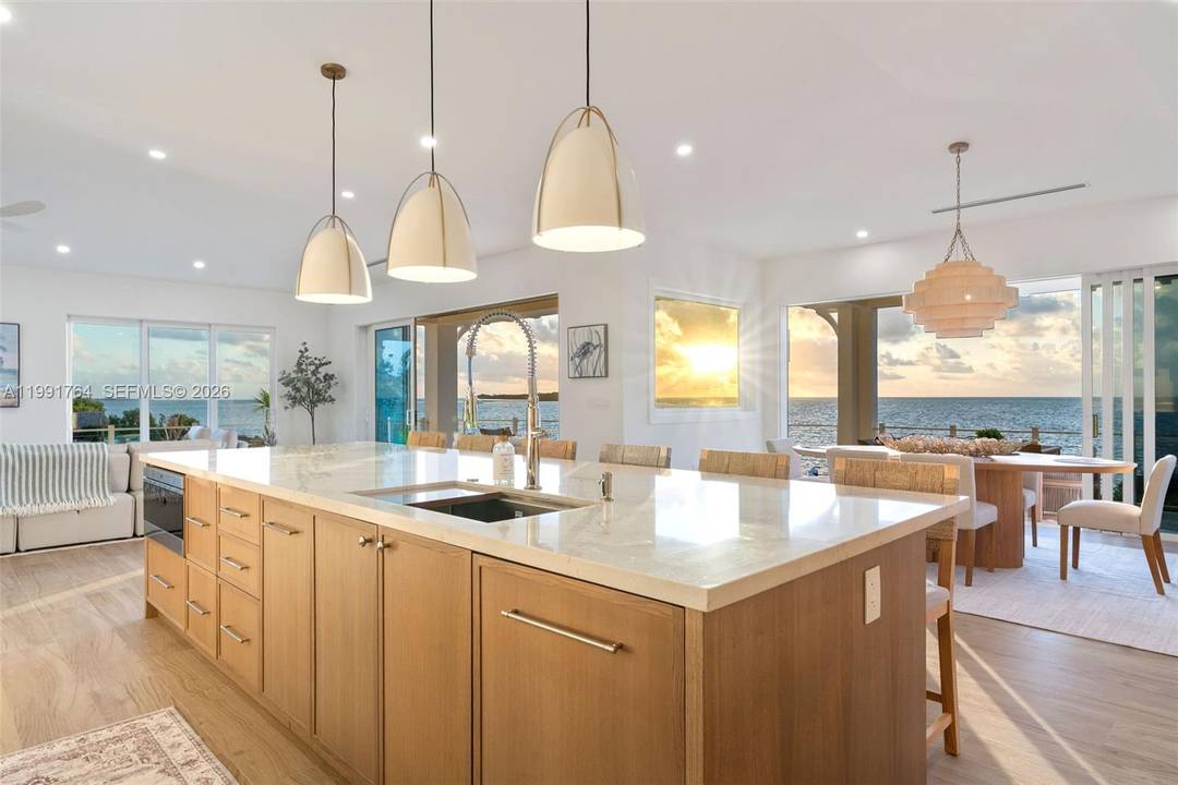 Brand new luxury oceanfront estate in Key Largo with over 300 ft of water frontage and sweeping open water views.