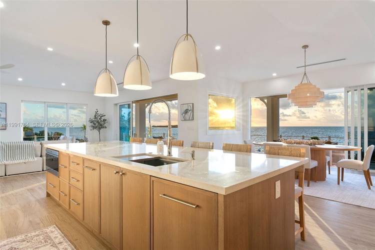 Brand new luxury oceanfront estate in Key Largo with over 300 ft of water frontage and sweeping open water views.