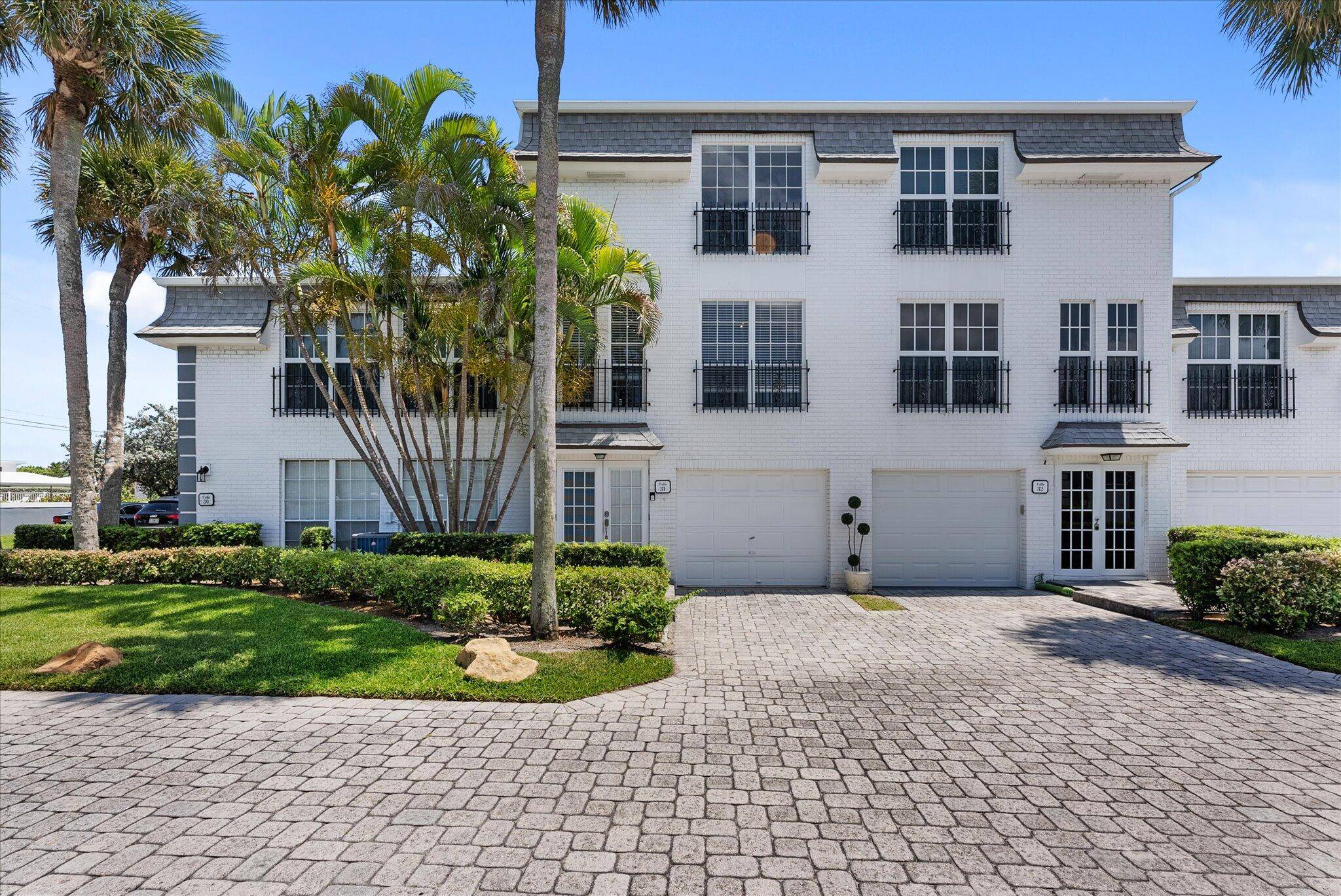 Located in prestigious Hillsboro Mile at the exclusive Hillsboro Beach and Yacht Club, this beautifully maintained three story townhome with attached one car garage is not to be missed !