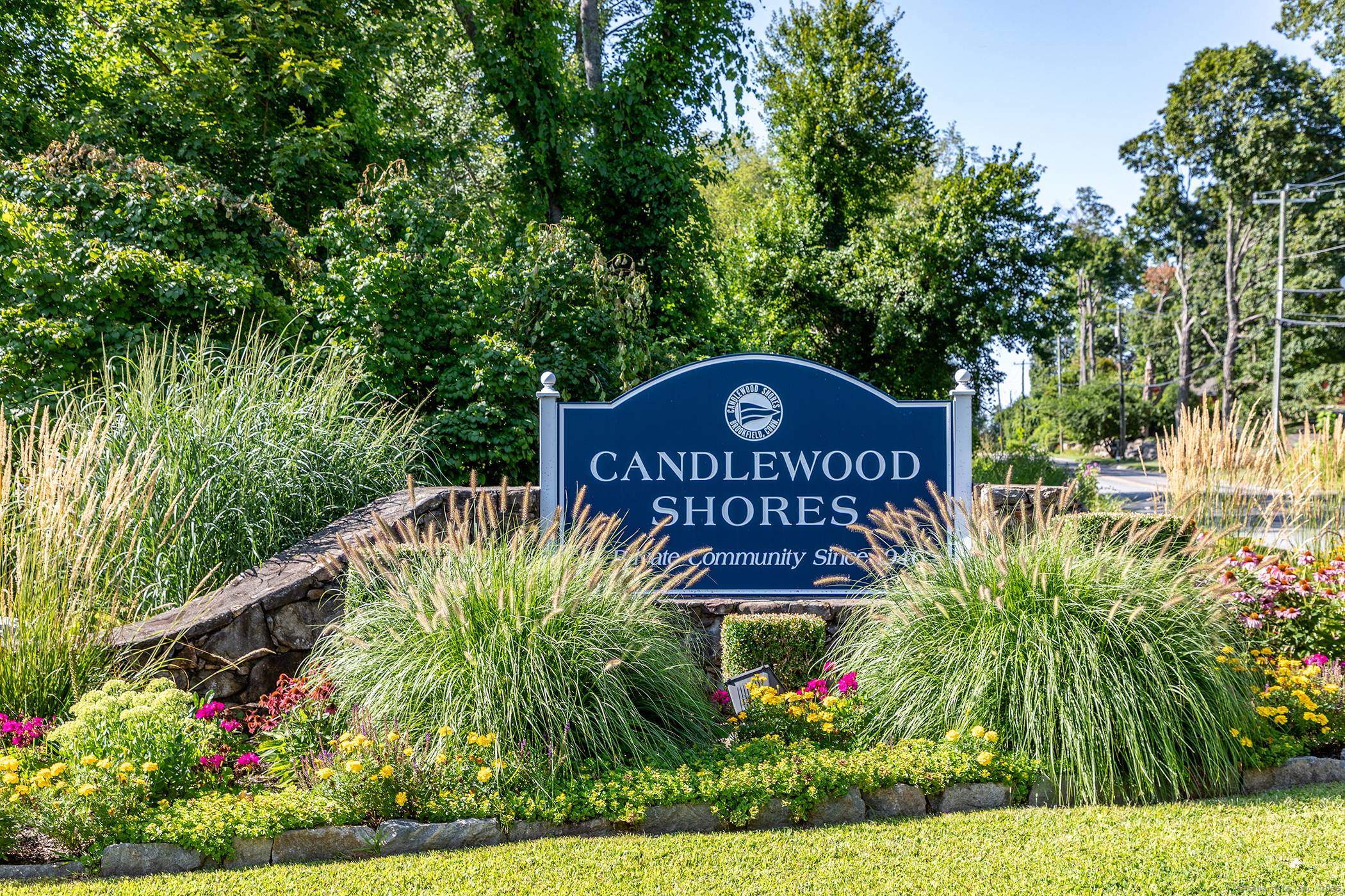 Discover the ease of main level loving, in this stunningly renovated Candlewood Shores Ranch with finished walk out lower level, large fenced yard, level property and a short walk to ...