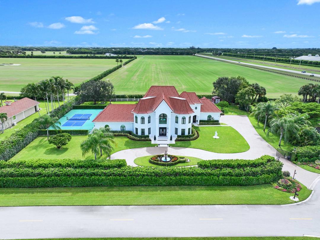 With no expenses spared, this completely renovated Southfield's of Palm Beach Polo Club Estate is situated on 5 private polo fields.
