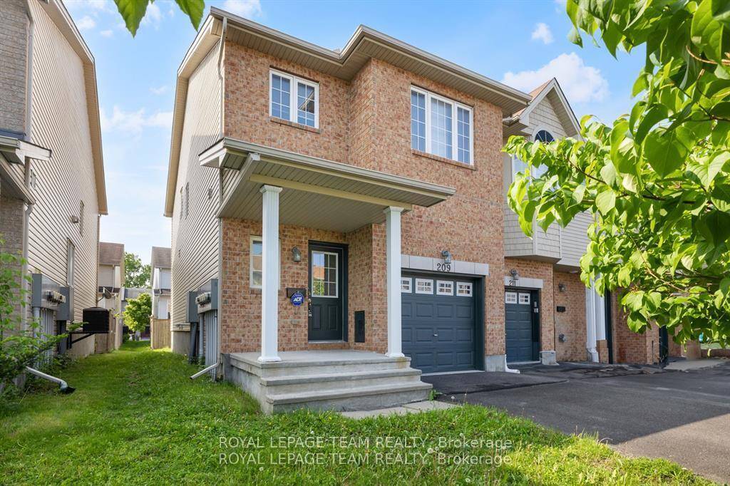 Immaculate end unit 3 bedroom loft townhome in the sought after Hunt Club area.