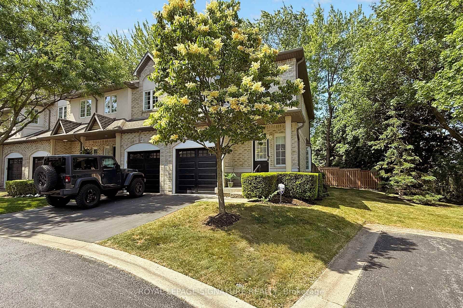 Welcome to this beautifully maintained furnished 2 bedroom, 4 bathroom executive end unit townhome in Burlington's highly sought after Maple District.