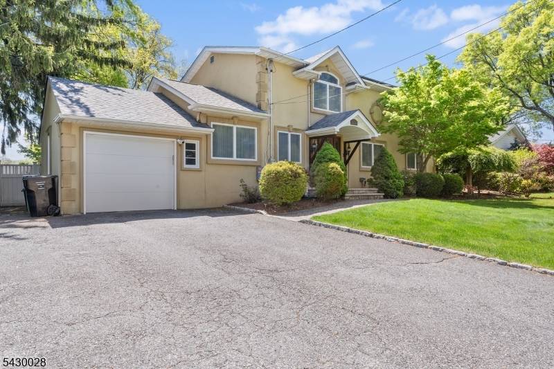Welcome to this beautifully maintained 4 bedroom, 4 full baths home located in the heart of Paramus.