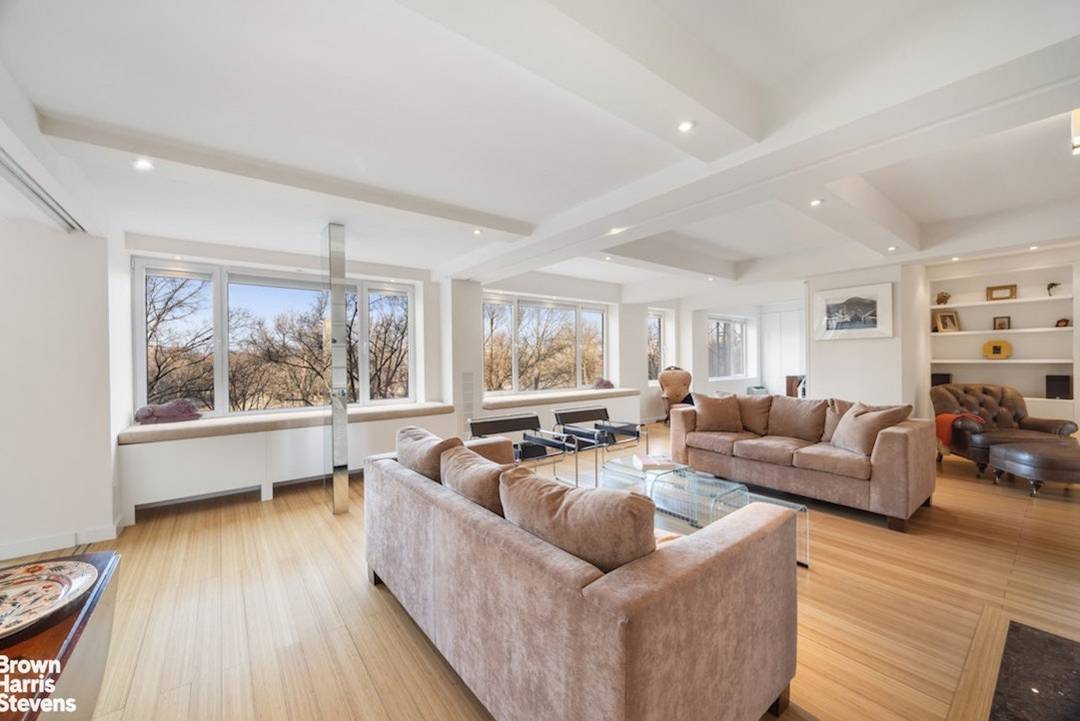 This exceptional home, a seamless blend of apartments 6B and 6C, directly overlooks Central Park from an expanse of approximately 50 feet of single pane windows looking north over Central ...