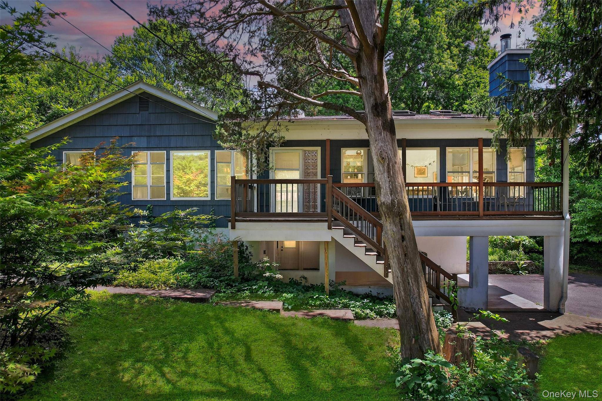 Nestled in nature, welcome to your private sanctuary in the heart of the highly desirable Merriewold Lake community in South Blooming Grove where serenity meets thoughtful design and comfort.