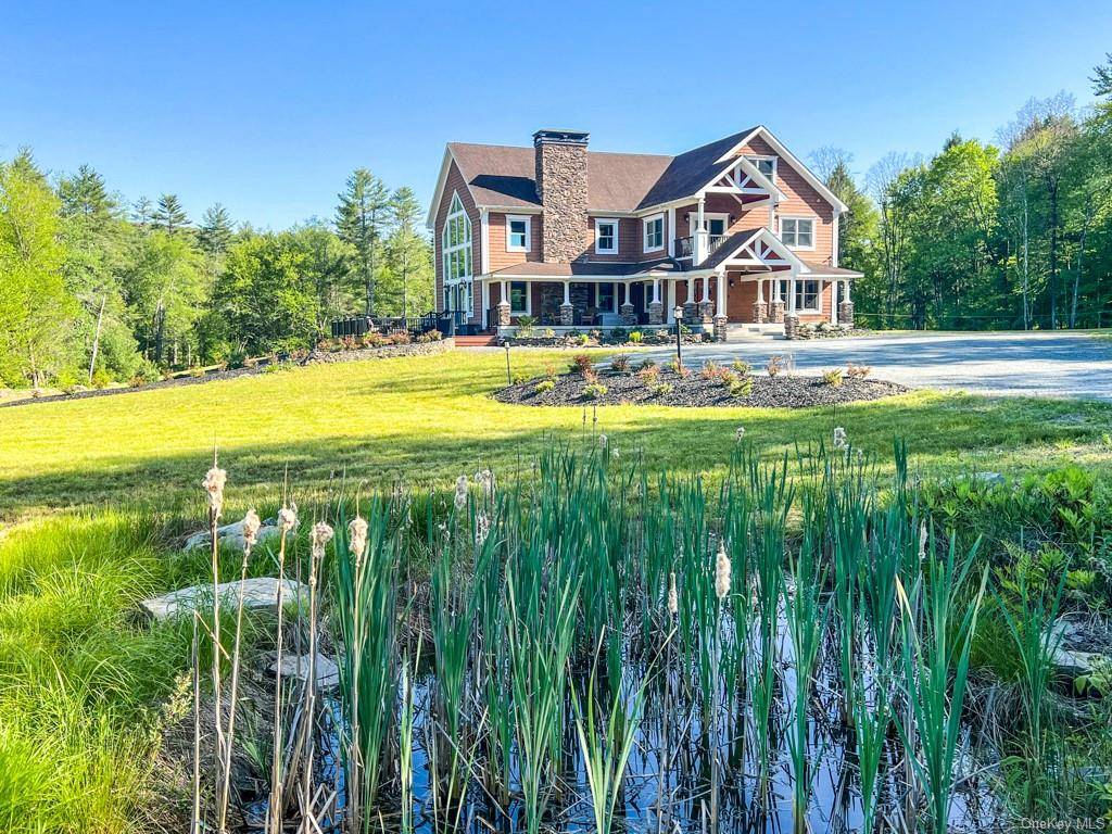 NEW ! Twin Rivers marries thoughtful design and top notch materials, set on a most gracious 32 acres that is enhanced by frontage on Ten Mile River and Perry Pond ...