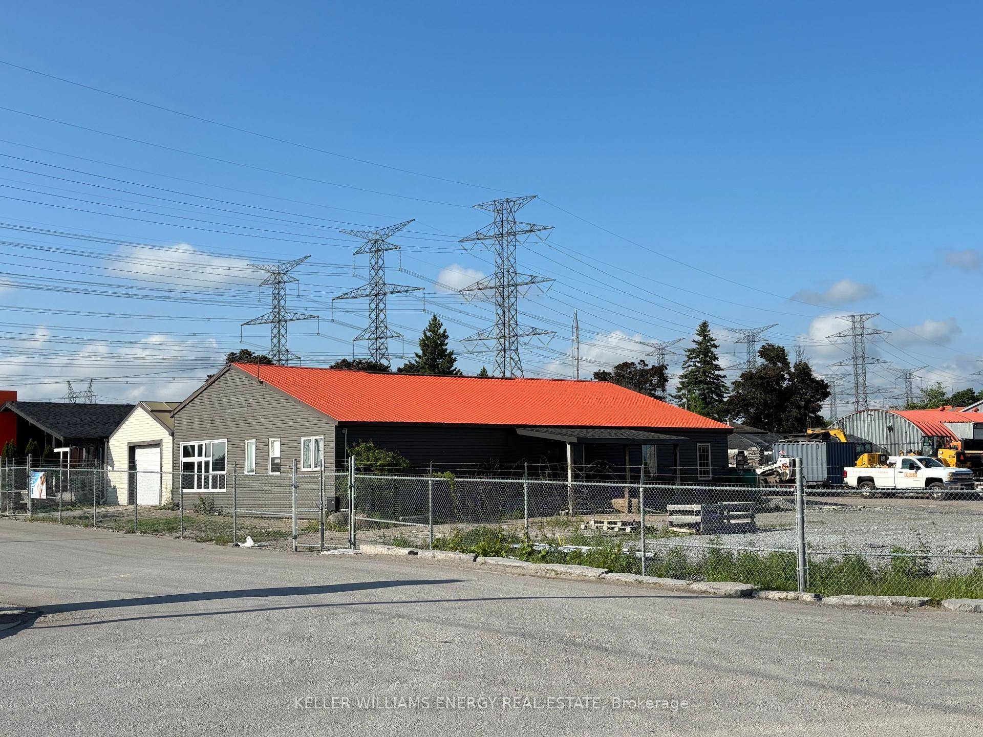 Building 4 with fenced yard for lease.