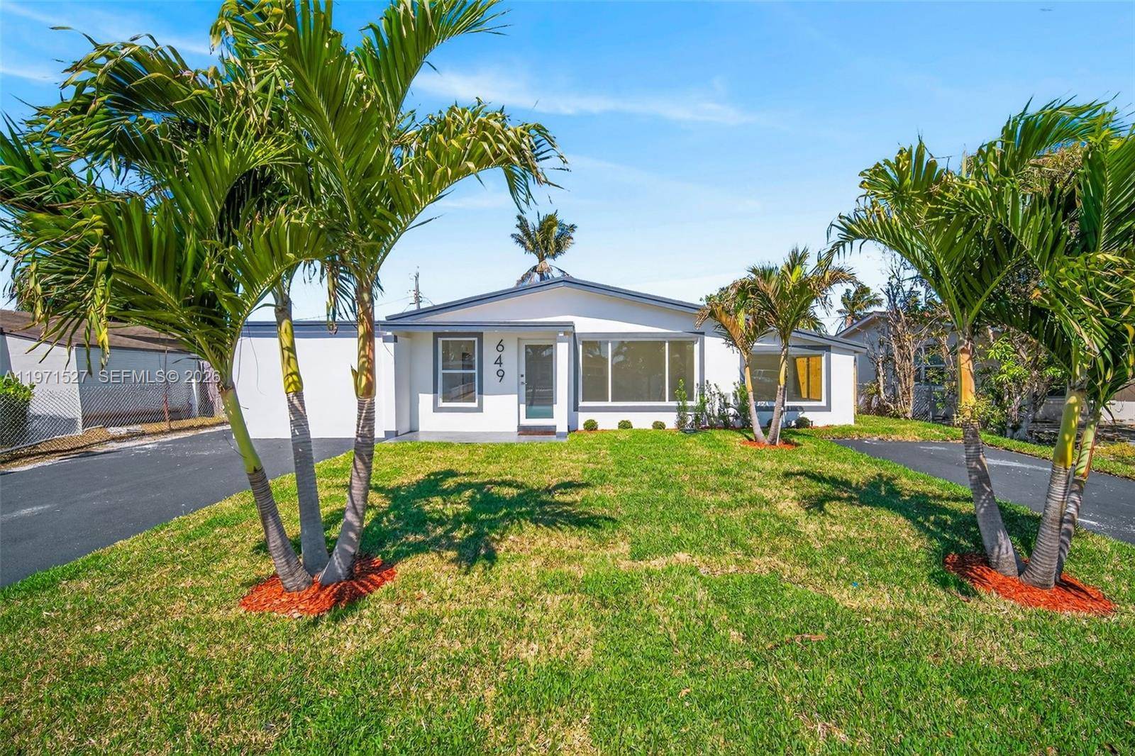 Welcome to this beautifully fully remodeled Pompano Beach retreat, where modern elegance meets relaxation.