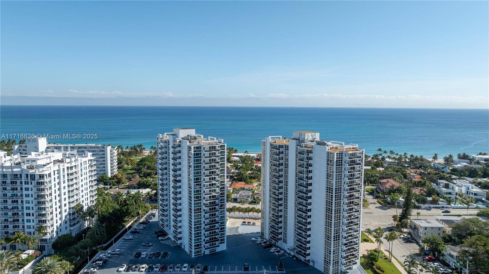 Beautiful, bright corner unit with floor to ceiling high impact windows, full of natural light, breathtaking Intracoastal, city, and partial ocean views.