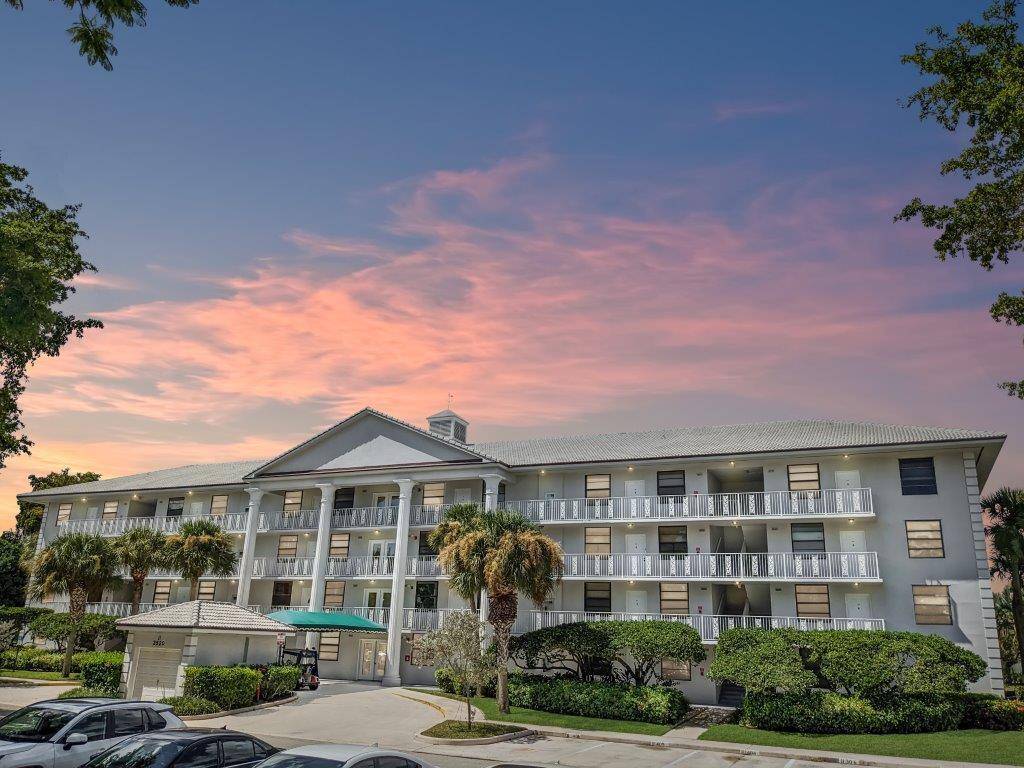 Beautifully updated condo with serene water views in a gated community featuring 24 hour manned security.