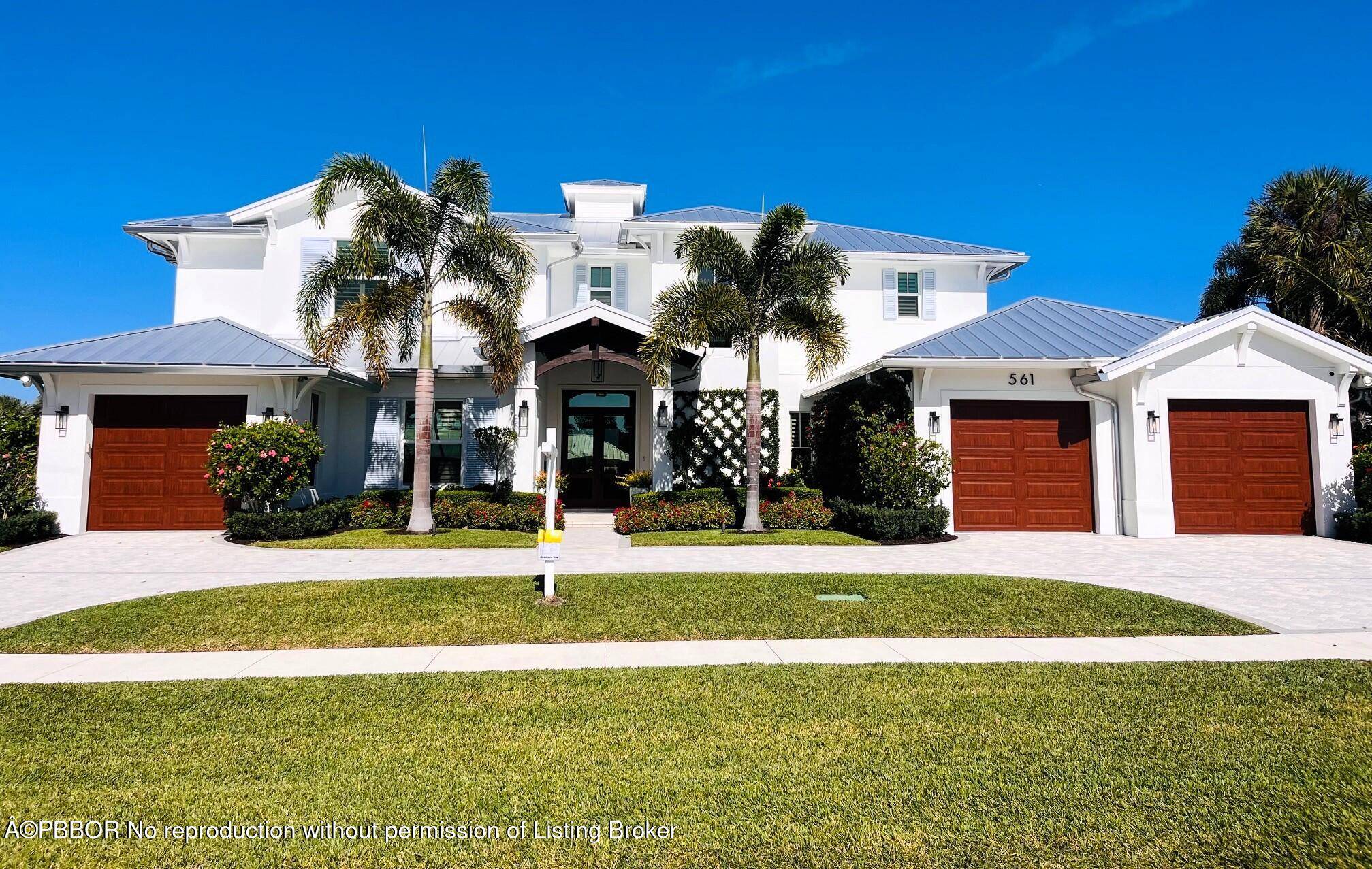 Spectacular golf course front home in the sought after community of North Palm Beach.