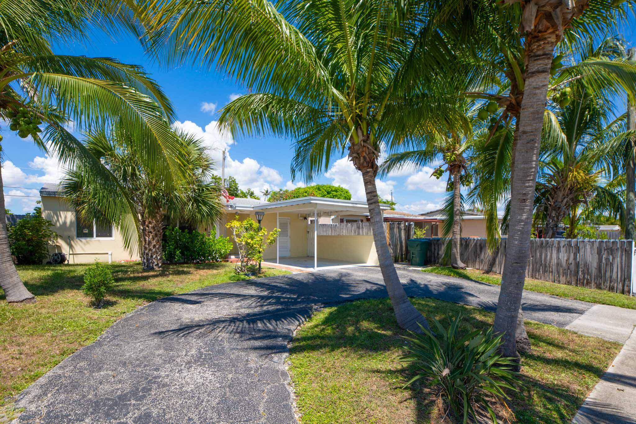 Updated within the last 6 years, this sunny and spacious 3 bedroom, 2 bath home features impact windows, a newer roof, and stylishly renovated kitchen and bathrooms.
