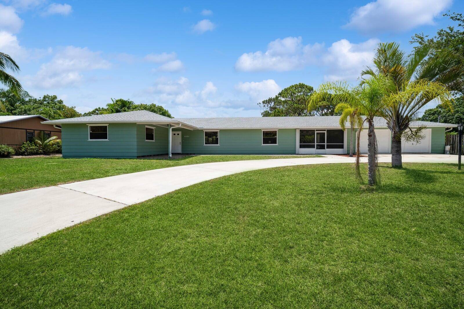 Tucked away in Indian River Estates with no HOA or restrictions, this 3 bedroom, 2.