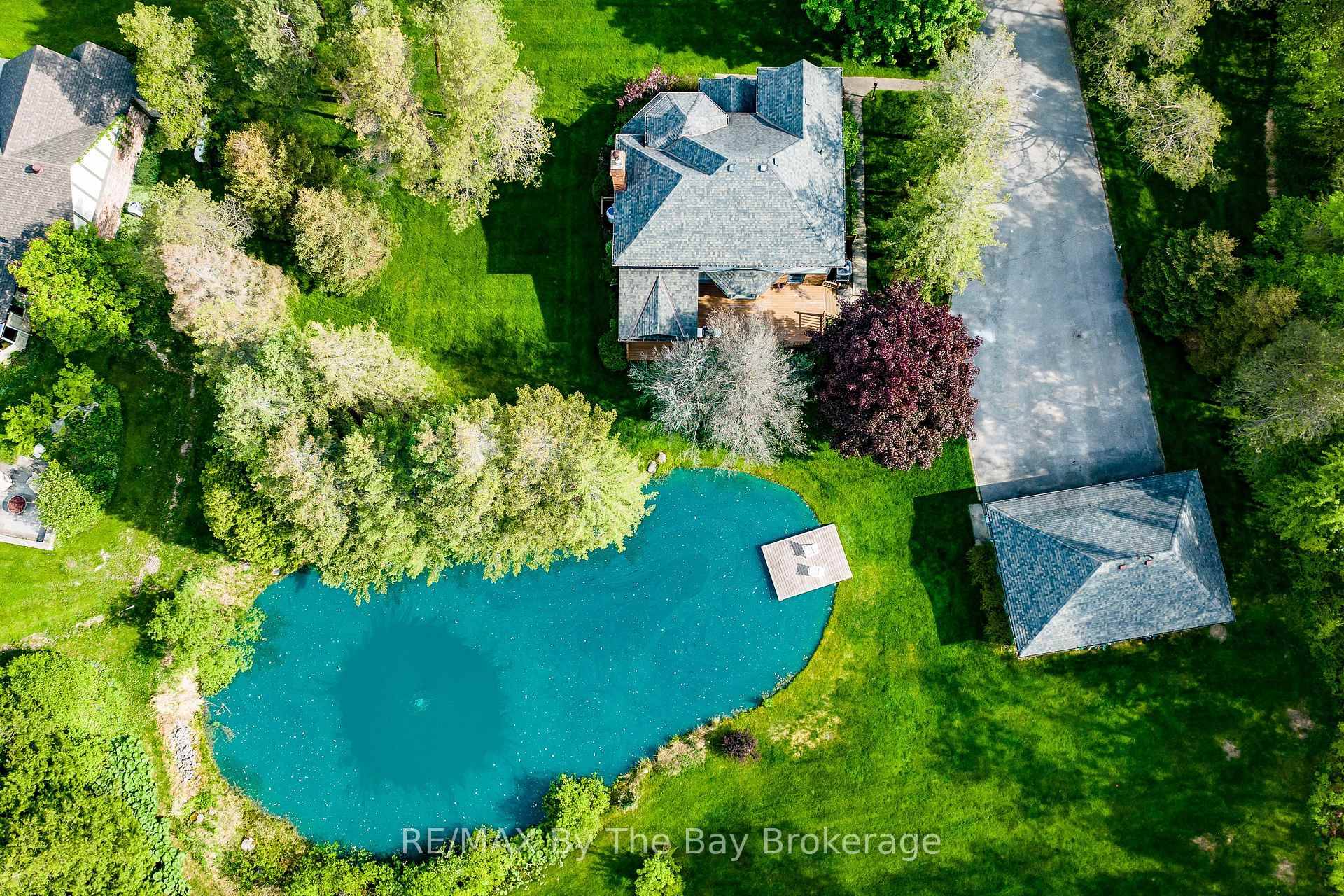 Welcome to Purple Hill Lane, A Victorian inspired residence sitting on a majestic, treed property in the prestigious Creemore hills.