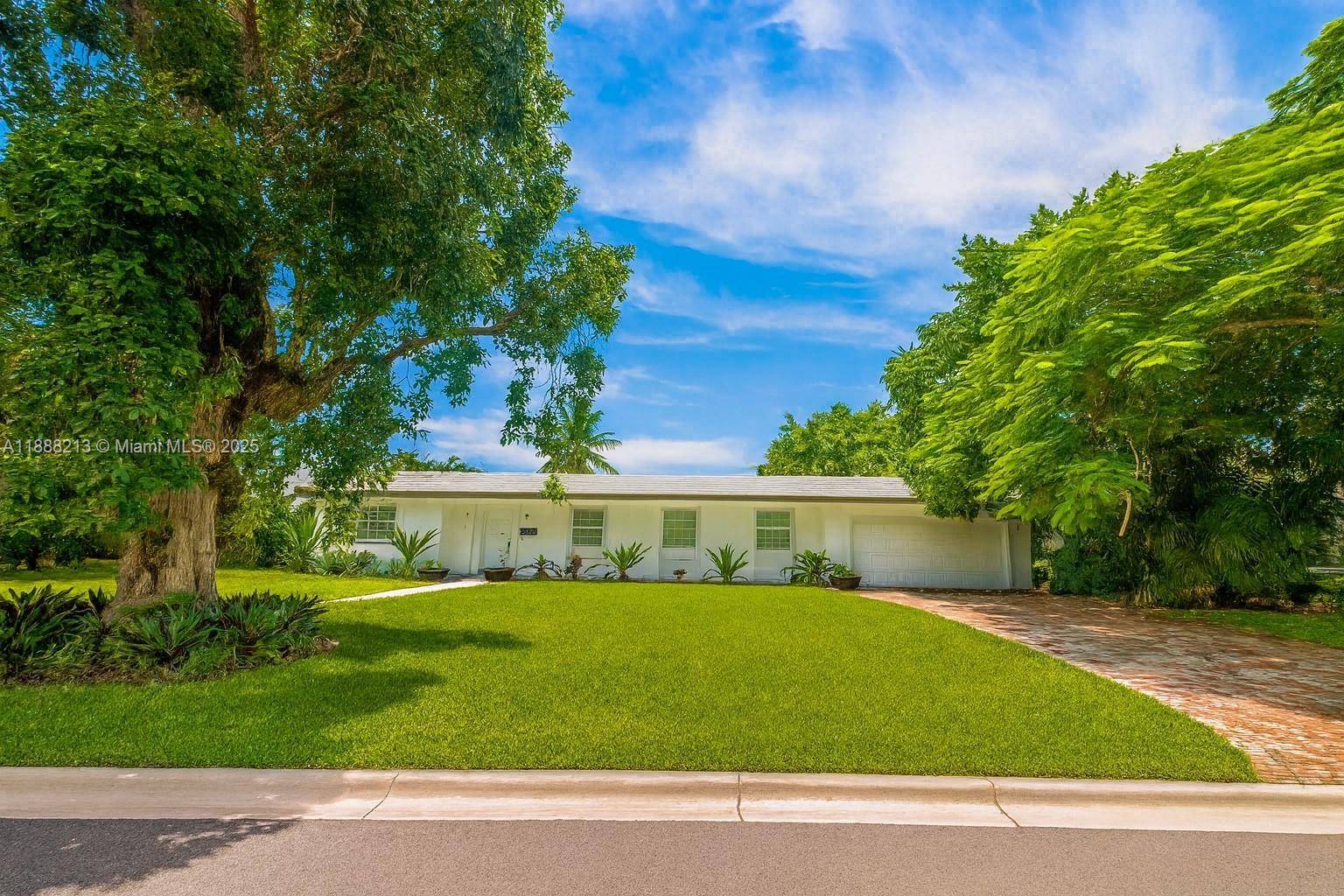 Welcome to 1422 Coruna Ave, an exceptional waterfront opportunity in the heart of Coral Gables.