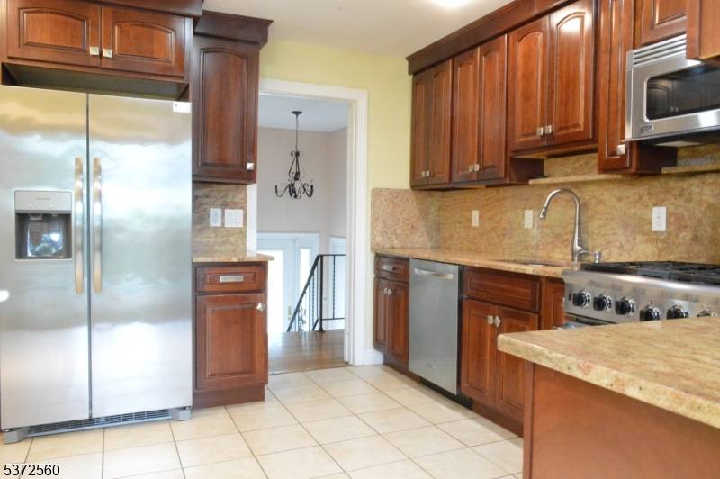 Fabulous 4 BR, 2. 5 Bath B L with a 2 Car Garage situated on the Glen Rock border but in the Fabulous town of Fair lawn !