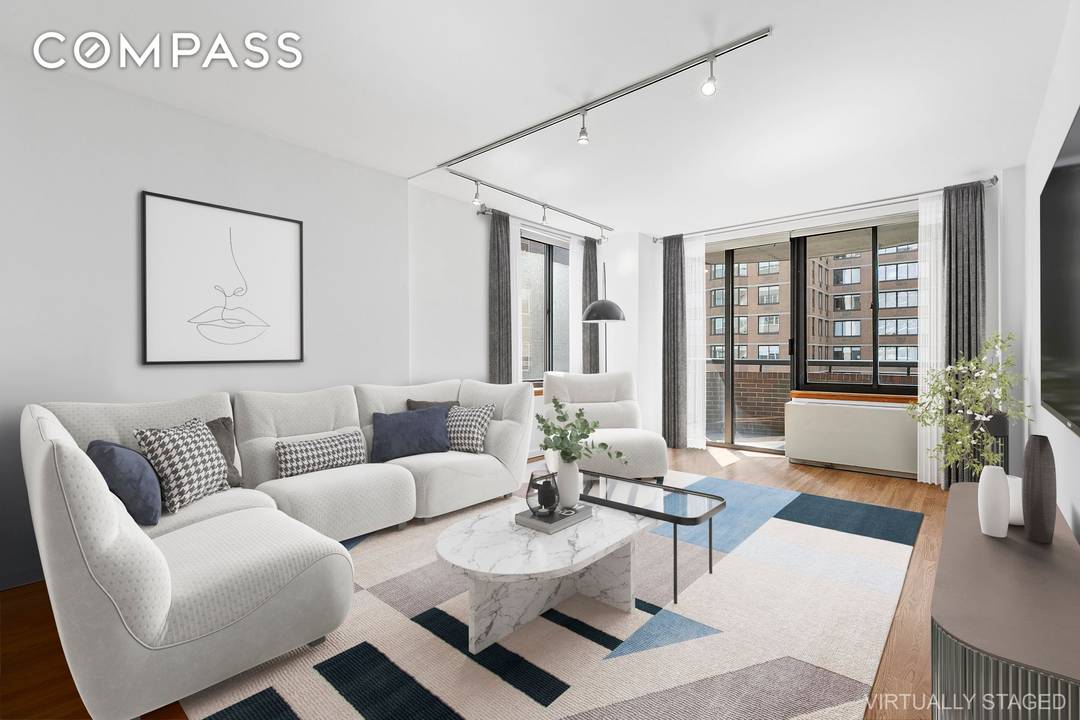Sunny and spacious two bedroom two bath condo with city views and two large private balconies in a prime Kips Bay full service building.