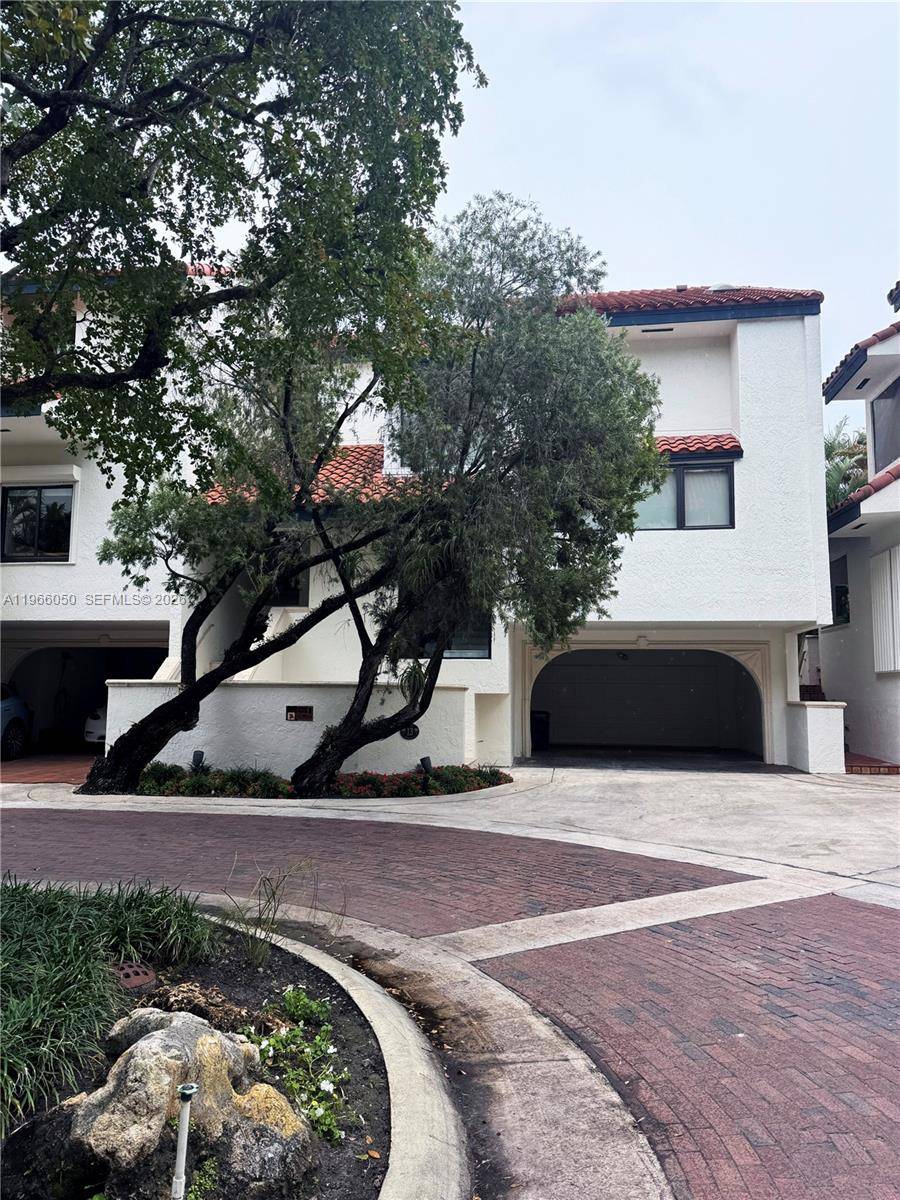 Experience private, gated resort style living at L Hermitage in the heart of Coconut Grove.