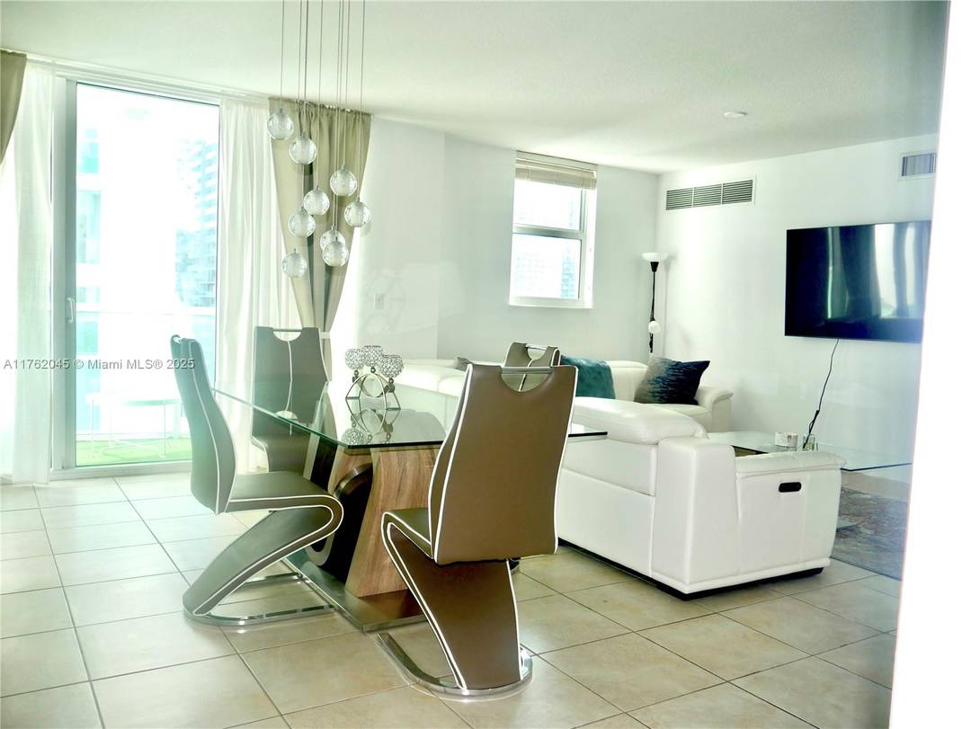 Experience luxury living in this stunning 2 bed, 2 bath corner unit in the heart of Brickell !