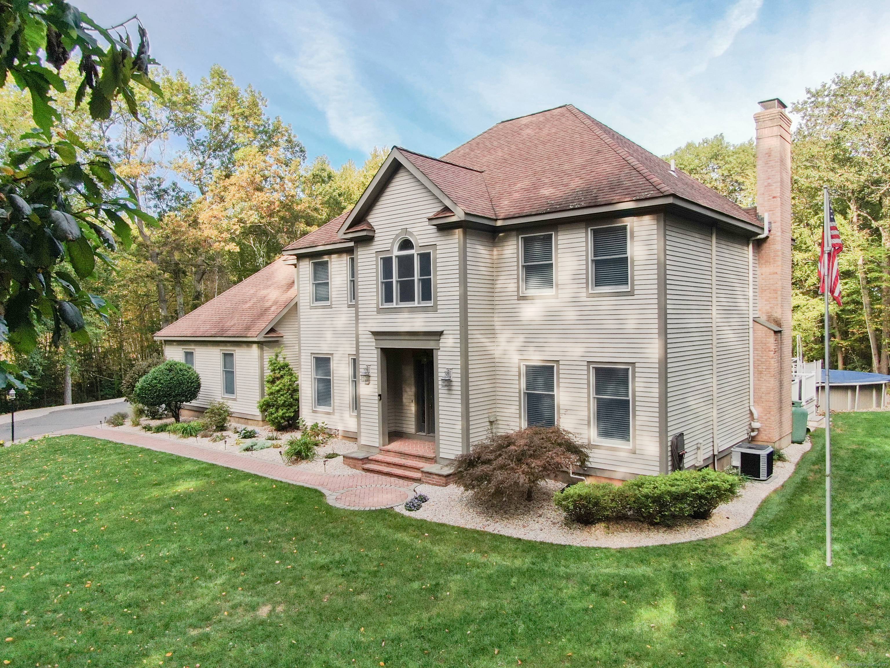 Beautiful 4 bedroom, 2. 5 bath Colonial set on 2 private acres !